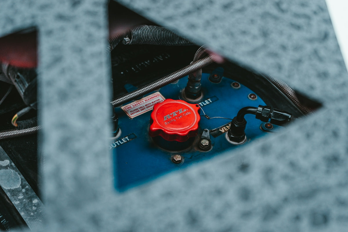 a close up of a red and black device