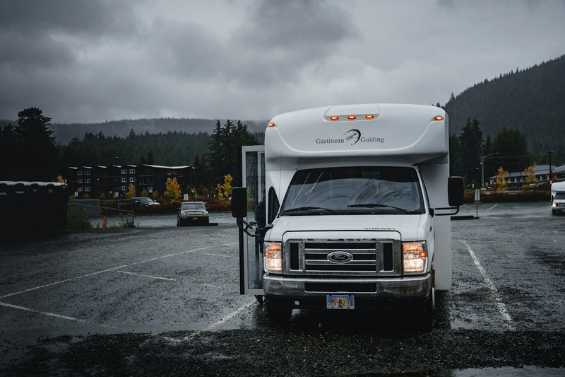 white Chevrolet RV on roadway