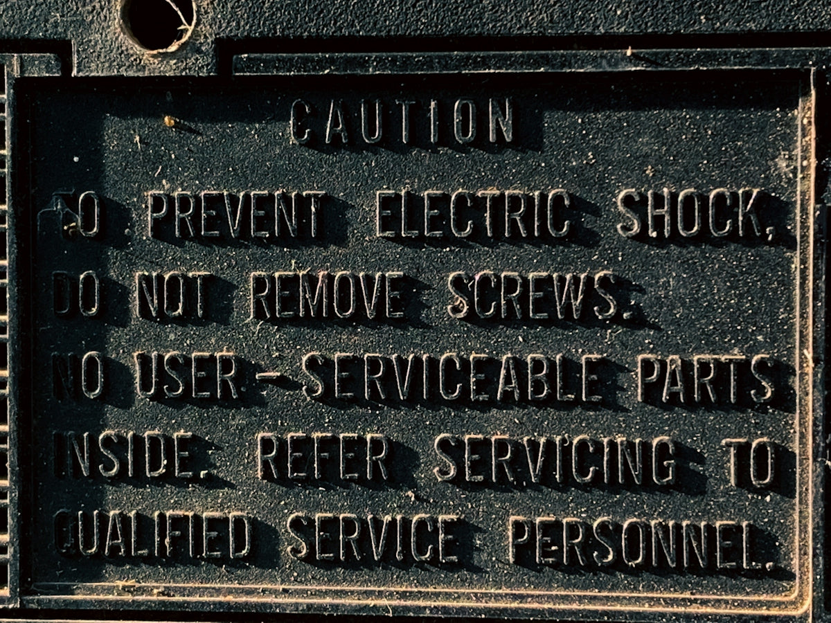 a plaque on the side of a building