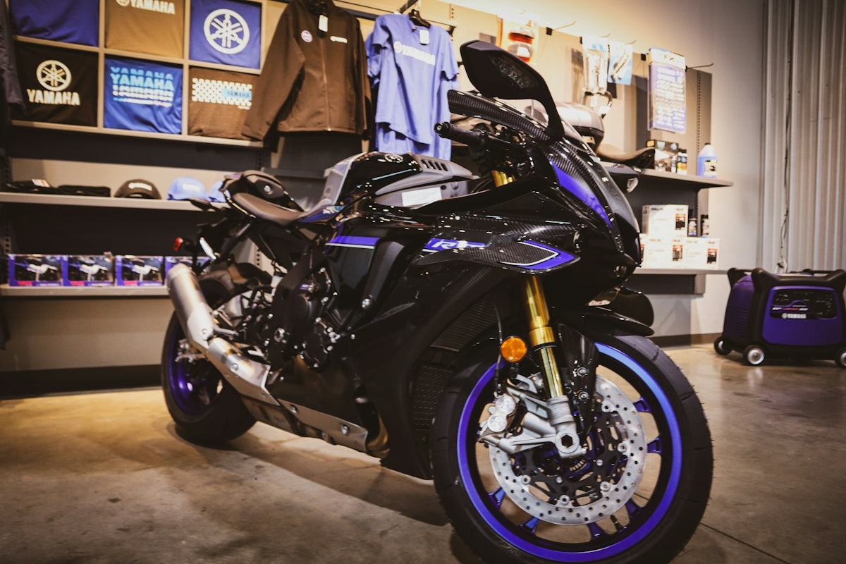 A black and blue sport motorcycle on display